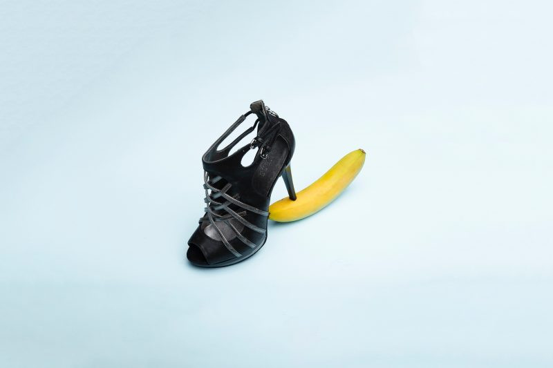 shoe stepping over a banana with heel
