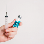 hand holding injection shot