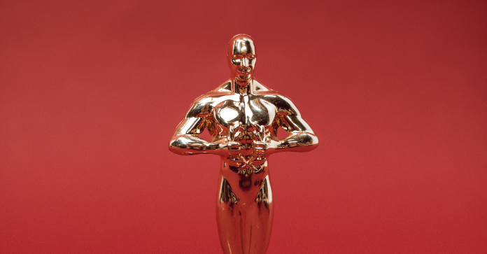 oscars trophy in red background