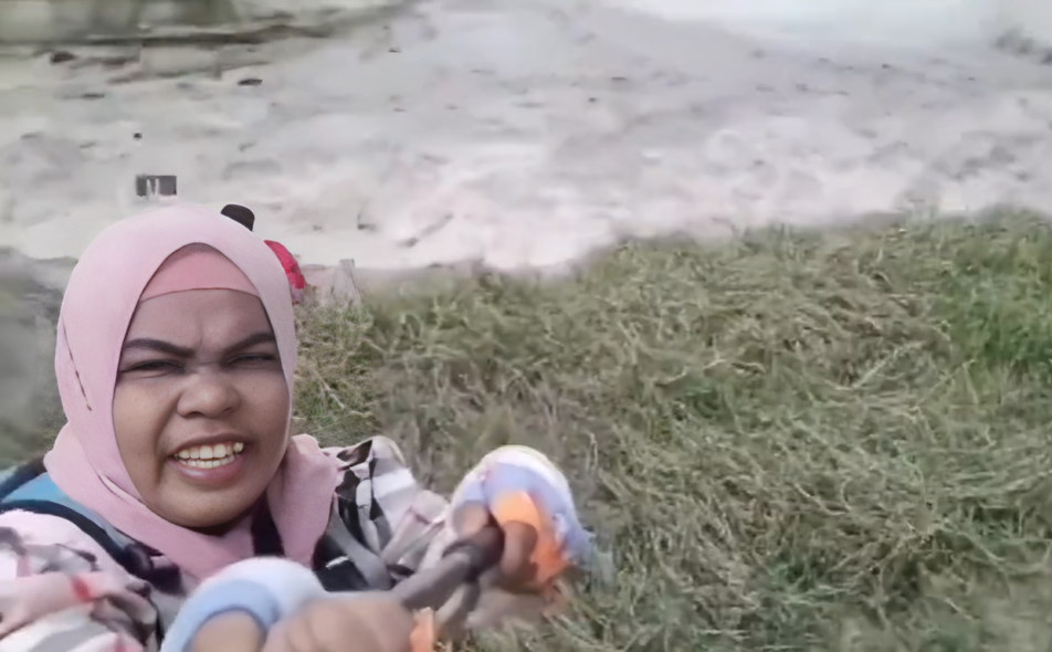 woman films tsunami selfie