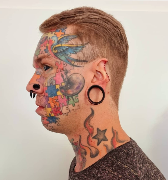 Puzzle face tattoo
