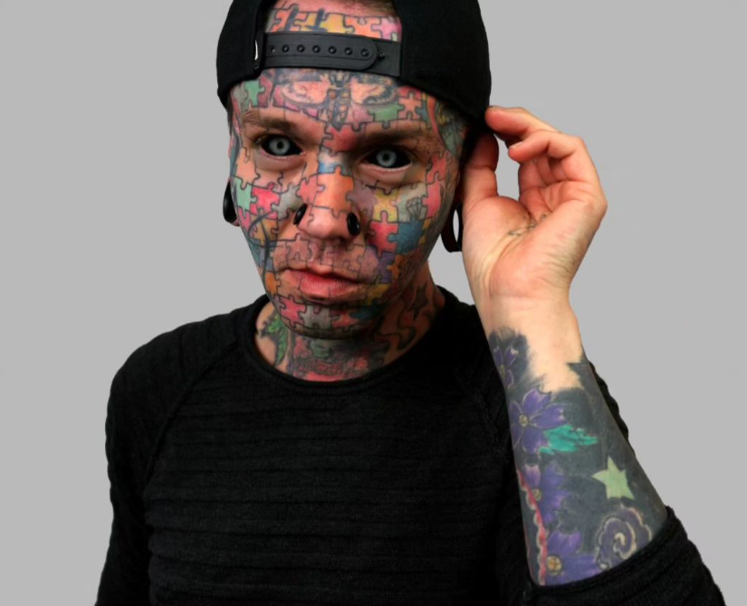 Puzzle face tattoo 