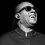 Stevie Wonder performing live as fans react to the Stevie Wonder blind rumor statement.