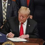 Donald Trump signing the SUPPORT Act