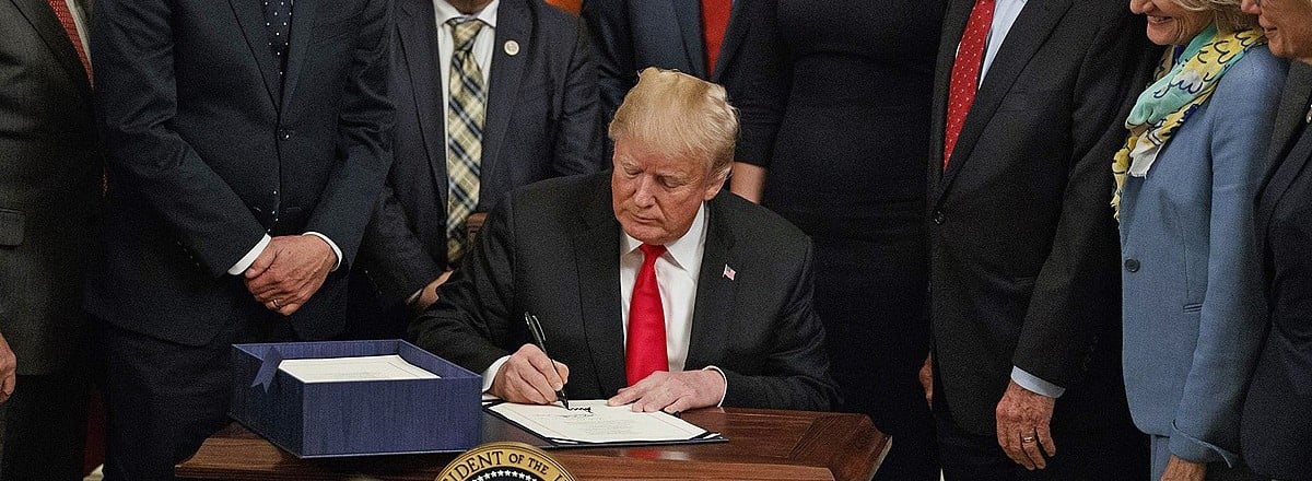Donald Trump signing the SUPPORT Act