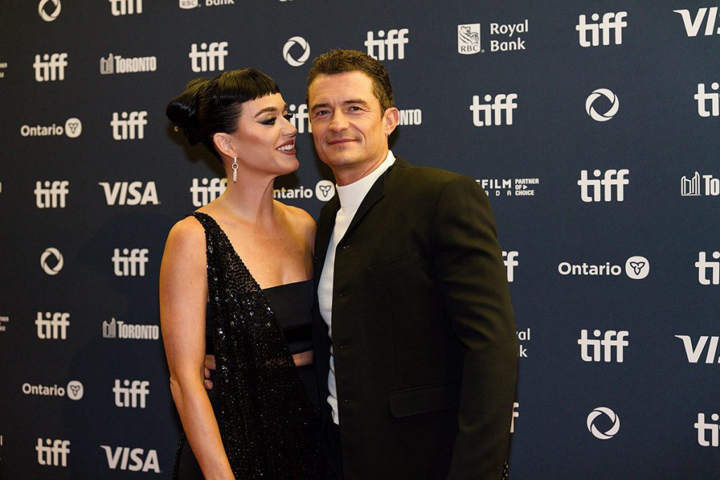 Smiling together while Katy Perry and Orlando Bloom co-parenting on a yacht