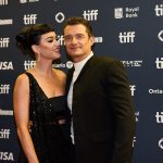Smiling together while Katy Perry and Orlando Bloom co-parenting on a yacht